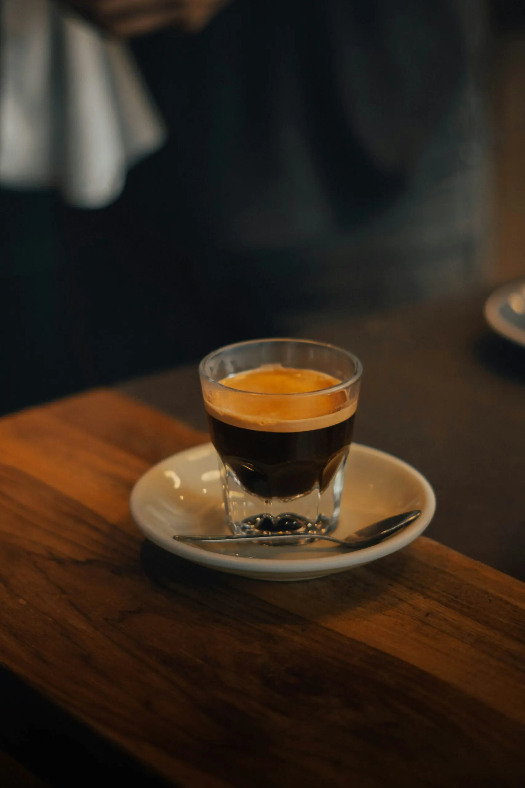 Espresso in a white cup with golden crema